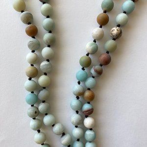 Flapper length glass bead necklace